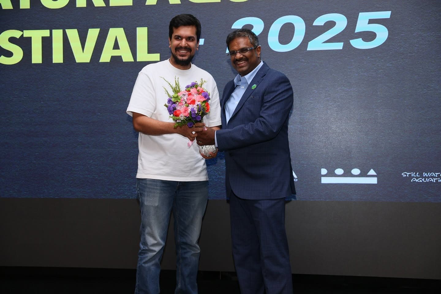 A participant felicitated with flowers